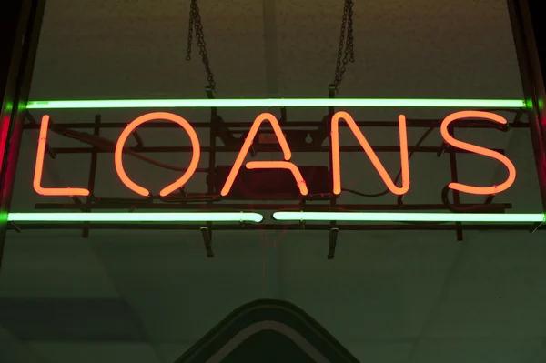 Can You Get a Loan While Owing Money?